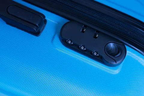 Combination lock on blue suitcase Stock Photos