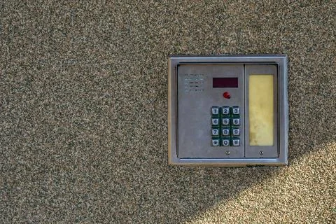 Combination lock control panel, intercom on the wall at the entrance to the.. 库存照片