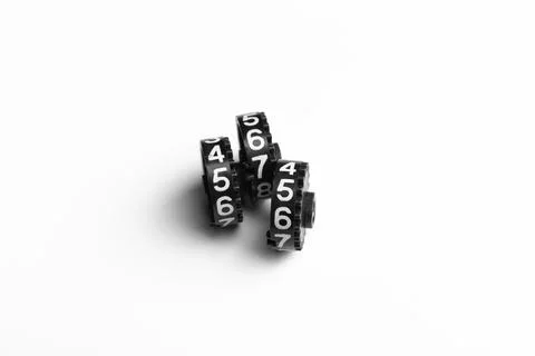 A combination lock rotating discs on a white background Stock Photos