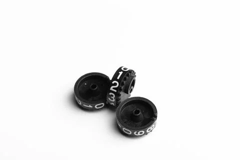 A combination lock rotating discs on a white background Stock Photos