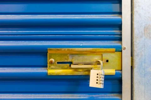 Combination lock on self storage door Stock Photos