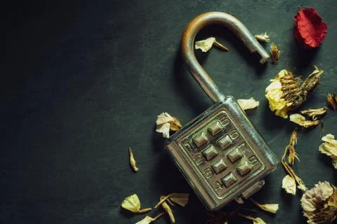 Combination padlock on blackboard background. Stock Photos