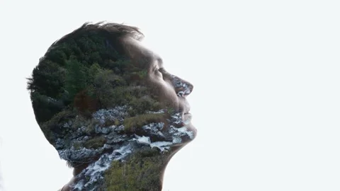 Combination of the silhouette of a man face and a landscape with mountains Stock Footage 285844838