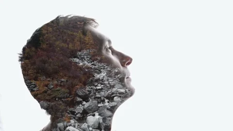 Combination of the silhouette of a man face and a landscape with mountains Stock Footage 285845072