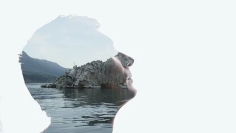Combination of the silhouette of a man face and a landscape with lake Stock Footage 285845296