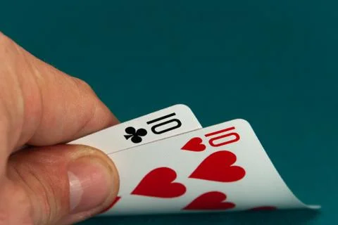 Combination of two different play cards in a hand 스톡 사진
