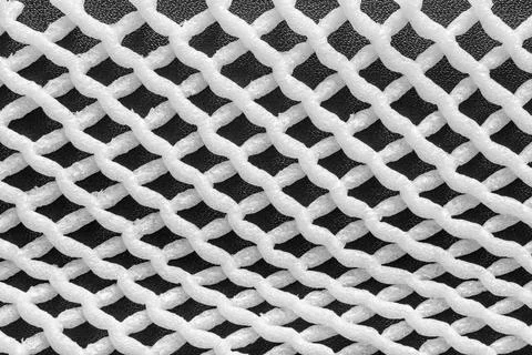 Combination white grid on a black background Stock Photos