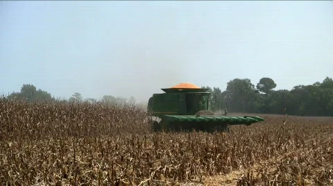 Combine coming around the corner Stock Footage 515058