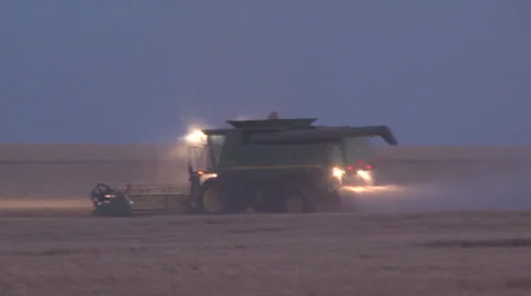 Combine cutting at Night Stock Footage 35575733