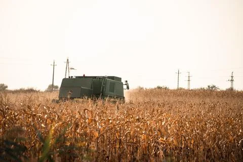 Combine harverster in work Stock Photos