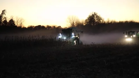 Combine Harvester at Sunset Stock Footage 233652757