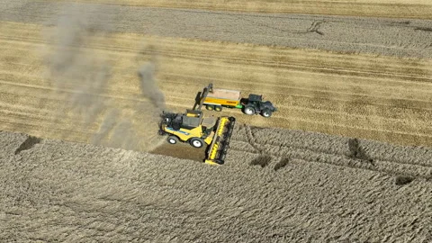 Combine Harvester at work in the field Stock Footage 247665837