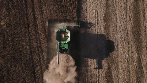 Combine harvester working in the field Stock Footage 97869844