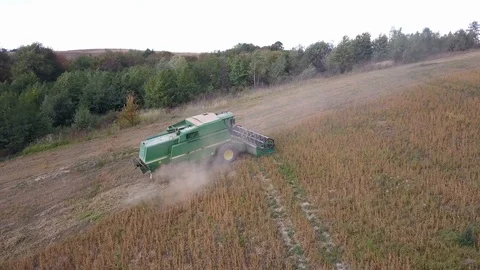 Combine harvester working on field Stock Footage 122832266