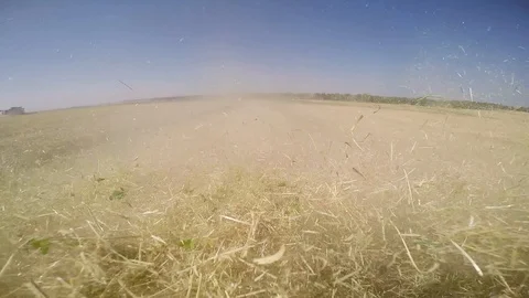 Combine harvesting grain Stock Footage 88884427