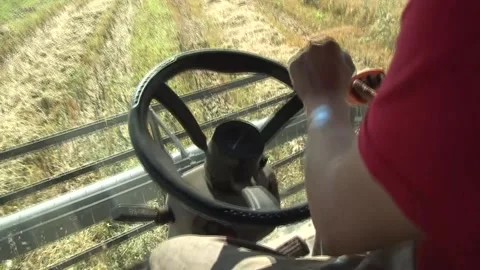 Combine operator in the process of harve... | Stock Video | Pond5