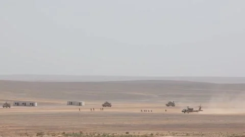 Combined arms live fire exercise in desert Stock Footage 276953063