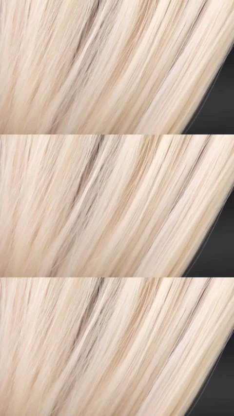 Combing blond hair with a comb close-up Stock Footage 321797853