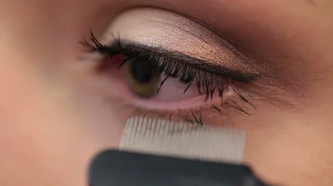 Combing eyebrows in a beauty salon Stock Footage 60126253