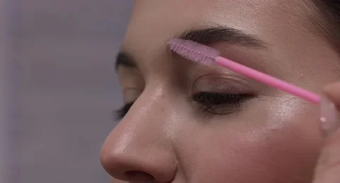 Combing eyebrows Stock Footage 149249512