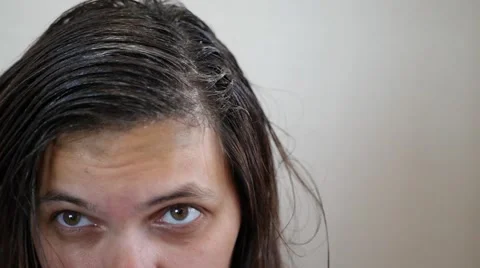 Combing hair dyed Stock Footage 68935094
