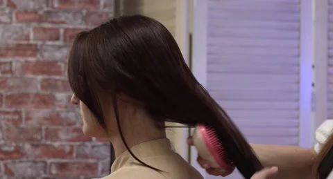 Combing hair Stock Footage 149549034