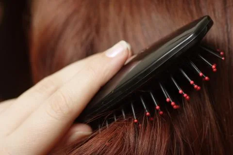 Combing of hair Stock Photos