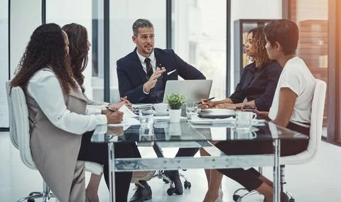 Combining information for aligned business operations. a group of colleagues Stock Photos
