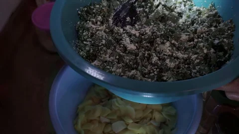 Combining meat and potatoes Stock Footage 106197203