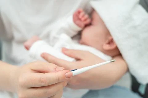 Combining tech and traditional techniques for baby's health. Concept of Stock Photos