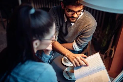 Combining their brain power Stock Photos