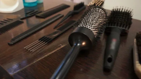 Combs and scissors on the table Stock Footage 87449523