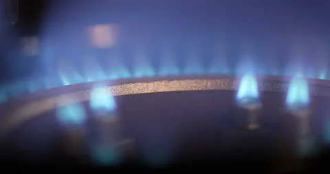 Combustion, extinction and ignition of gas in a household gas stove. Video stock 168180984
