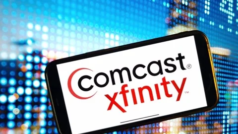 Comcast Xfinity logo displayed on mobile phone Stock Footage 260421297