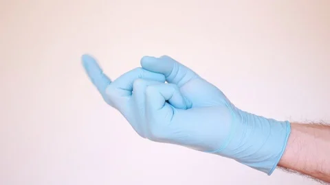 Come here gesture/hand in blue latex glove Stock Footage 96239767