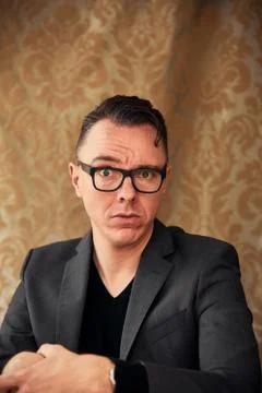 Comedian looking doubtful Stock Photos
