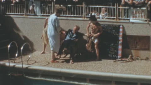 Comedic Mock Barber Routine At Public Pool Australia 1960s Stock Footage 345529473