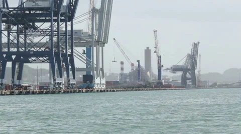 Comercial container ship docks piers cranes Stock Footage 44375779