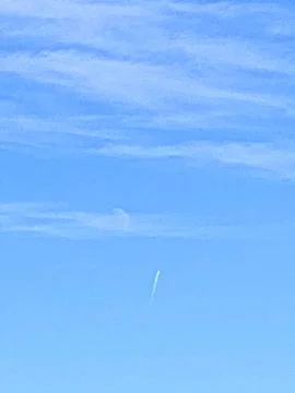 Comet and moon in the sky with clouds Stock Photos
