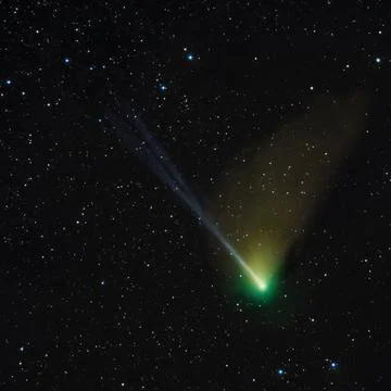 Comet C2022 E3, bright green nucleus and Comet's ion tail. Stock Photos