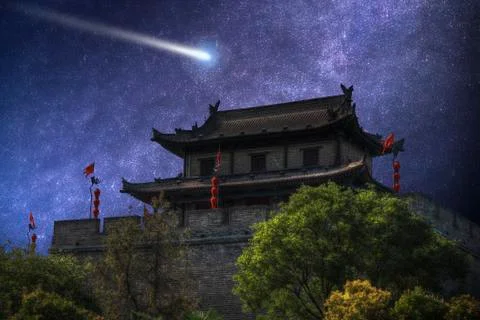 Comet flies in the night sky Stock Photos