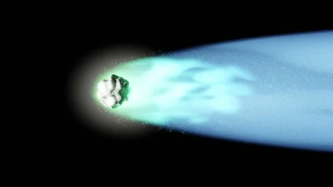 Comet with greenish core and a blue tail with ice particles falling off Stock Footage 246783774