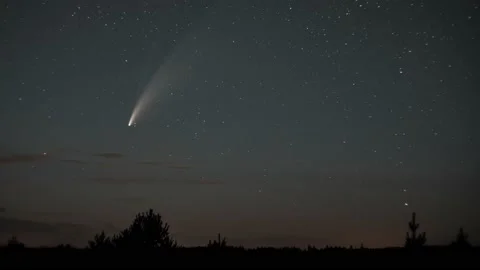 The comet moves across the night sky among the stars Stock-Footage 135461376