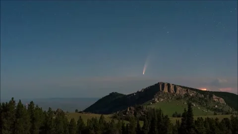 Comet Rising Over Mountain With Lightning Stock Footage 153068931