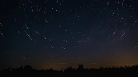 Comet-shaped star trails in the night sky Stock Footage 145747718