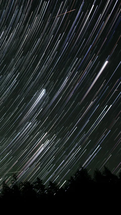 Comet-shaped star trails in the night sky Stock Footage 270297790