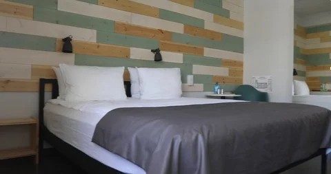 Comfortable bed in stylish bedroom Stock Footage 90008416
