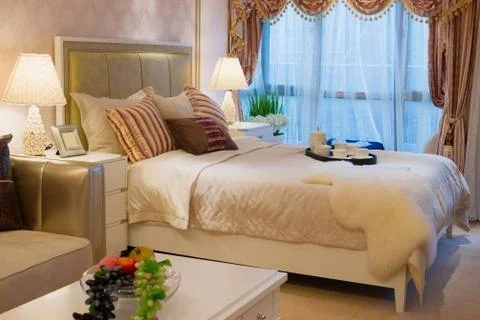 Comfortable bedroom Stock Photos