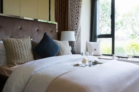 Comfortable bedroom Stock Photos