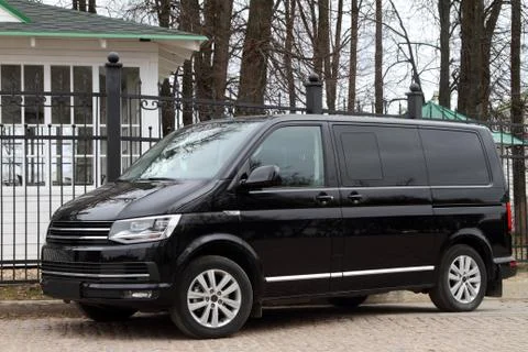 Comfortable black minivan. Stock Photos